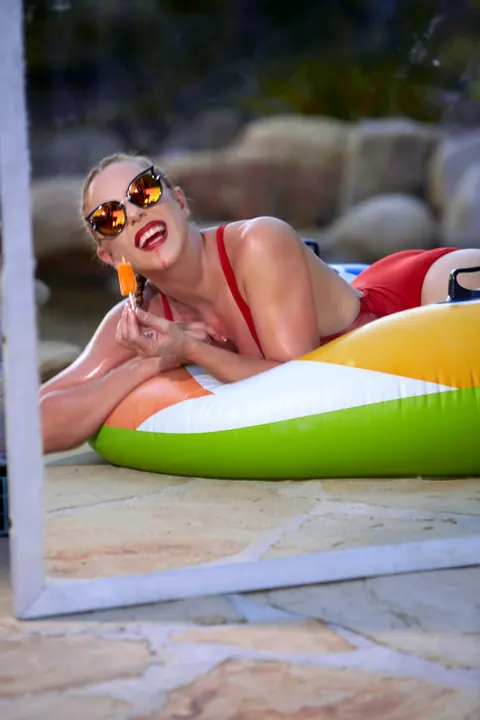 Woman with Glasses Teases by the Pool – photo 16 of 21