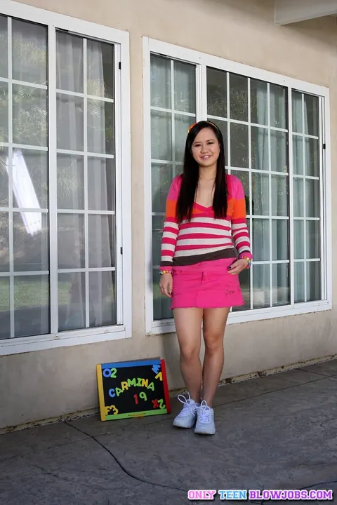 Carmina Kai: Asian Brunette Bares Her Small Tits and Sucks Lollipop – photo 1 of 21