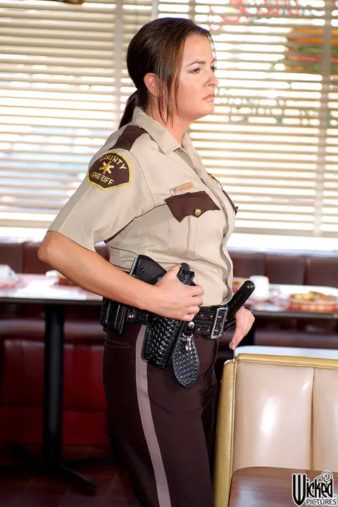 Devinn Lane: Thick Brunette MILF in Uniform Poses with Big Tits – photo 10 of 17