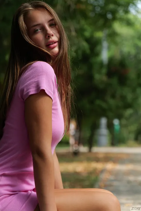 Olya Derkach: Brunette with Small Natural Tits Turns and Flashes Her Ass in the Park – photo 2 of 12