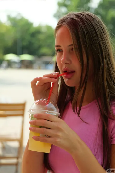 Olya Derkach: Brunette with Small Natural Tits Turns and Flashes Her Ass in the Park – photo 6 of 12