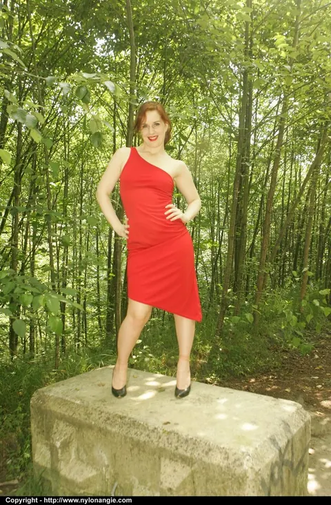 Dirty Angie: Curvy Redhead MILF Strips Off Her Red Dress Outdoors in Tan Nylons – photo 4 of 12