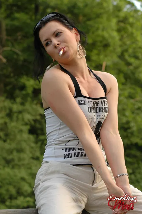 Brunette PAWG Poses Fully Clothed Outdoors by a Fence – photo 11 of 15