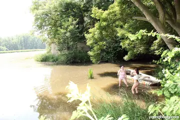 Shione – Two Latina BBWs Kiss, Lick and Share a Dildo by the River