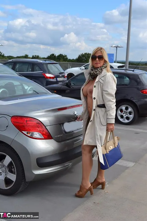 Nudechrissy: European Blonde MILF Flashes Her Big Tits Outdoors – photo 4 of 20