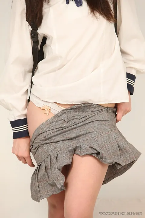 Woman in a Uniform Spreads and Fucks Her Ass with a Blue Dildo – photo 3 of 18