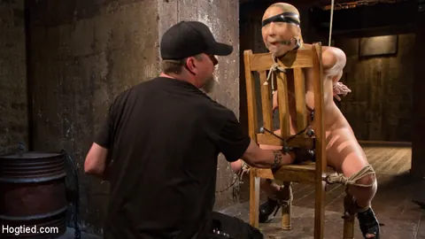 Abella Danger: Thick Brunette in a Skirt and Heels Restrained in Dungeon Bondage – photo 7 of 15