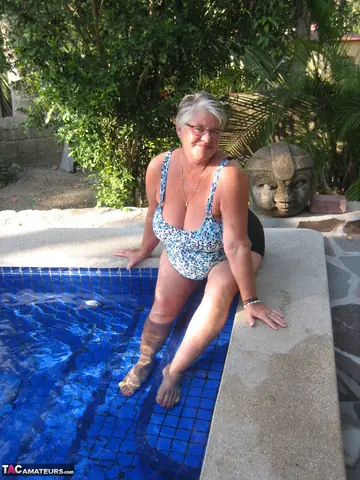 Curvy Woman Strips Nude and Skinny Dips in the Backyard Pool