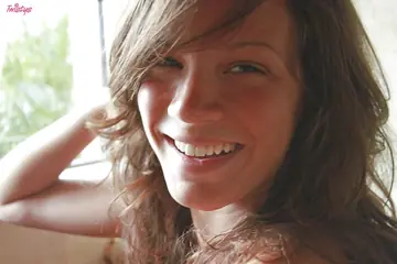 Curly-Haired Woman Spreads Her Pussy and Shows Her Feet in the Bathroom