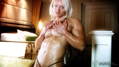 Brigita Brezovac: European Blonde MILF Flexes Her Muscles in a Bikini at the Gym – photo 10 of 21