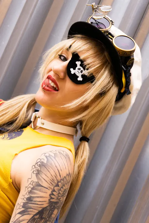 Kitty Quinn: Blonde Latina in Costume Spanks Her Ass and Teases the Camera – photo 5 of 15