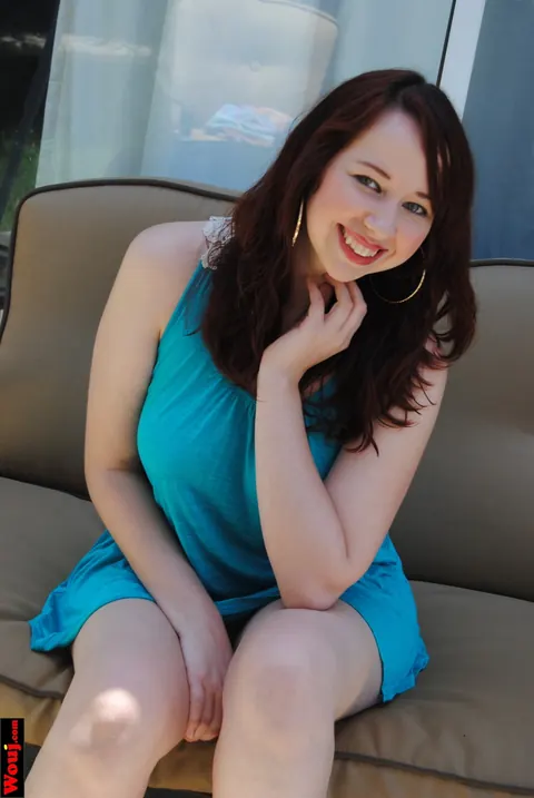 Alisyn Carliene: BBW Brunette Shows Her Curves in a Blue Dress on the Sofa – photo 14 of 15