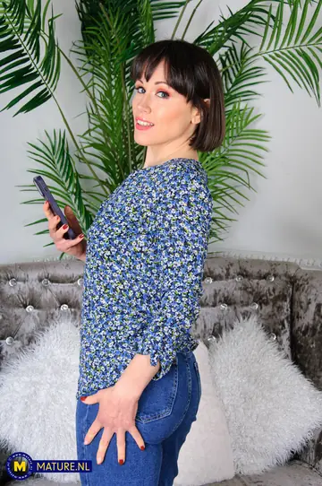 European MILF in Jeans Plays with Nipples and Dildo