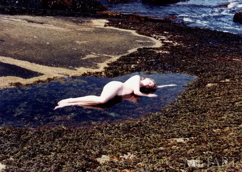 Naked Woman Spreads Her Pussy Wide on the Beach – photo 2 of 18