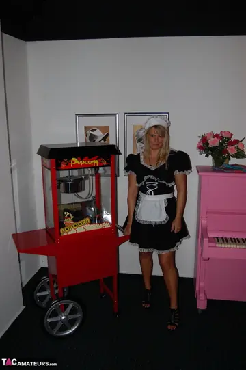 Sweet Susi – European Blonde MILF Strips Out of Her Maid Costume