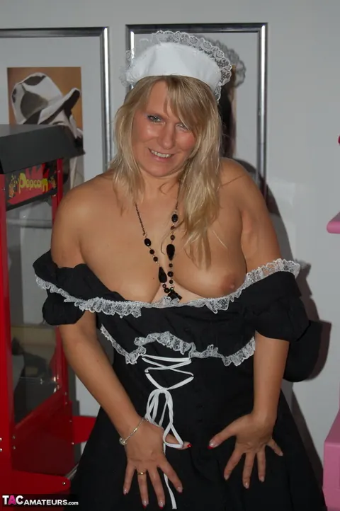 Sweet Susi: European Blonde MILF Strips Out of Her Maid Costume – photo 10 of 16