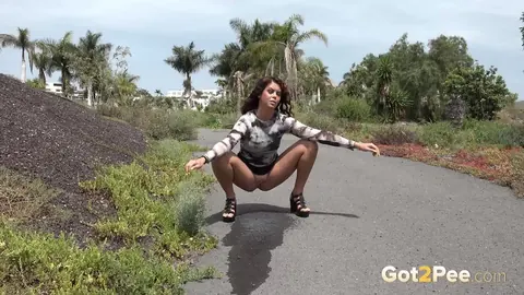 Brunette PAWG Squats and Pisses on a Public Paved Road – photo 8 of 15