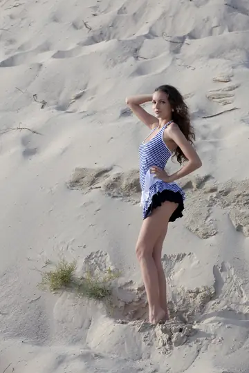 Kolumbina A – Curly Brunette Poses Nude on the Beach
