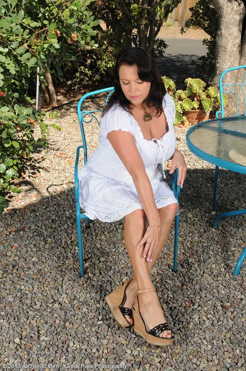 Angelica Sin: Brunette MILF in Lingerie Fingers Her Pussy Outdoors – photo 1 of 16