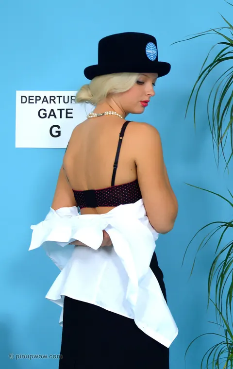 Busty Blonde Pinup Strips Out of Her Air Hostess Uniform – photo 9 of 17