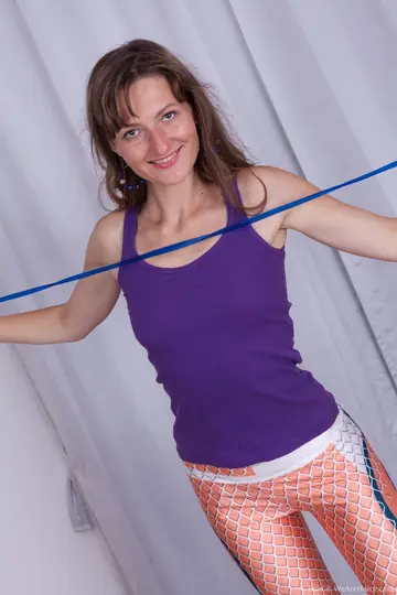 Mature Brunette Undresses to Show Her Hairy Bush