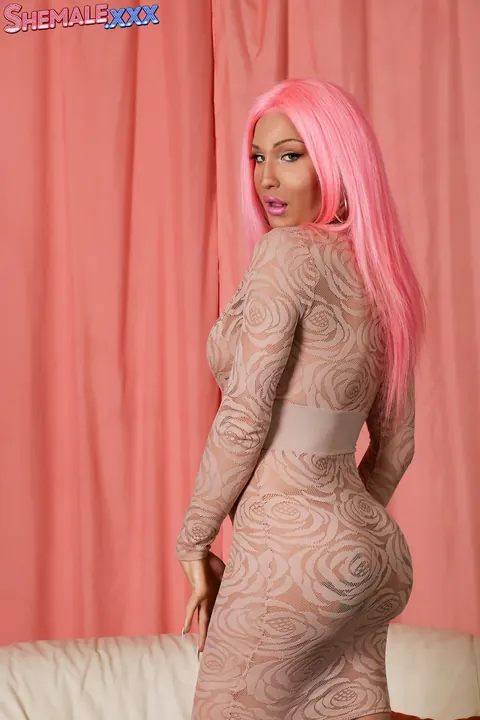 Trans Woman Lets Her Dress Fall to the Floor and Poses Nude Front and Back – photo 1 of 16
