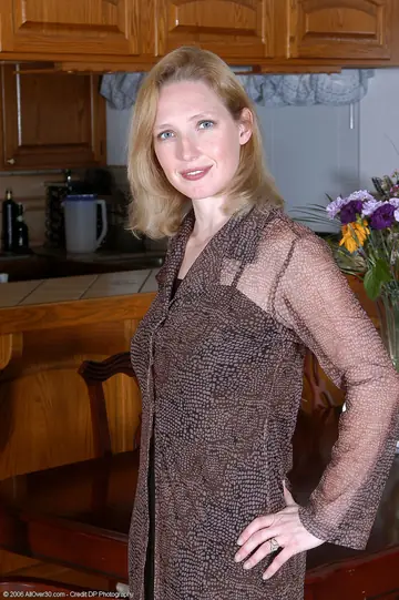 Pale MILF Strips Off Her Clothes and Keeps Stockings and Boots On