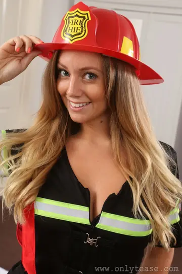 Blonde Firefighter Strips Out of Her Uniform for Lingerie and Heels