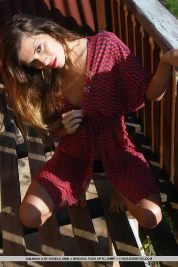 Slim Woman Shows Her Feet and Fingers Her Pussy on the Balcony