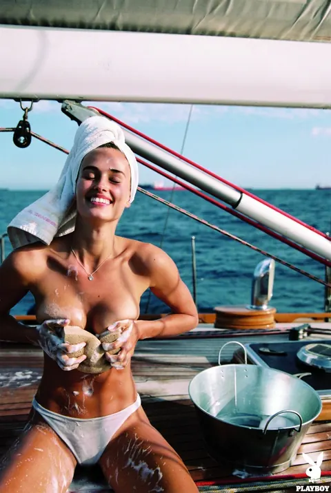 Johanne Landbo: Tall Tanned Brunette in Glasses Shows Her Big Tits on a Boat – photo 5 of 21