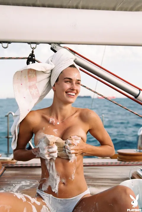 Johanne Landbo: Tall Tanned Brunette in Glasses Shows Her Big Tits on a Boat – photo 10 of 21