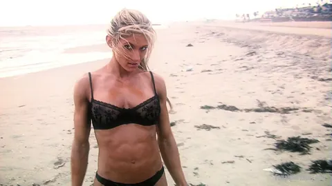 Abby Marie: Busty Blonde MILF Shows Off Her Athletic Body in a Bikini on the Beach – photo 10 of 21