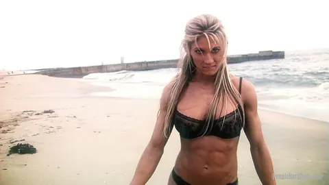 Abby Marie: Busty Blonde MILF Shows Off Her Athletic Body in a Bikini on the Beach – photo 5 of 21