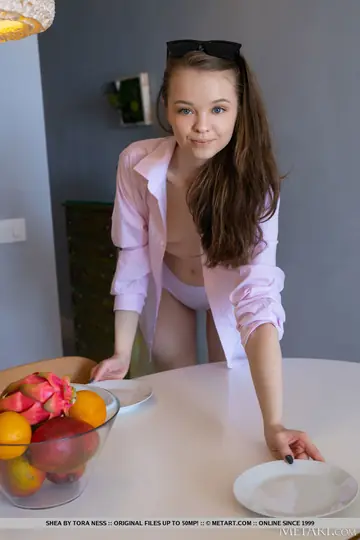 Woman Strips Out of Her Panties in the Kitchen