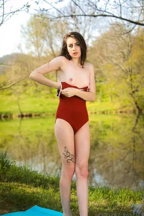 Courtney Martin: Short-Haired Brunette Strips Out of Her Bodysuit Outdoors – photo 7 of 21