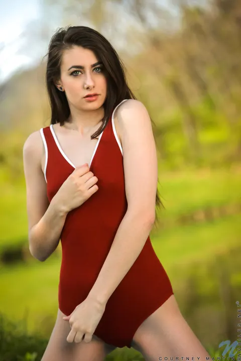 Courtney Martin: Short-Haired Brunette Strips Out of Her Bodysuit Outdoors – photo 5 of 21