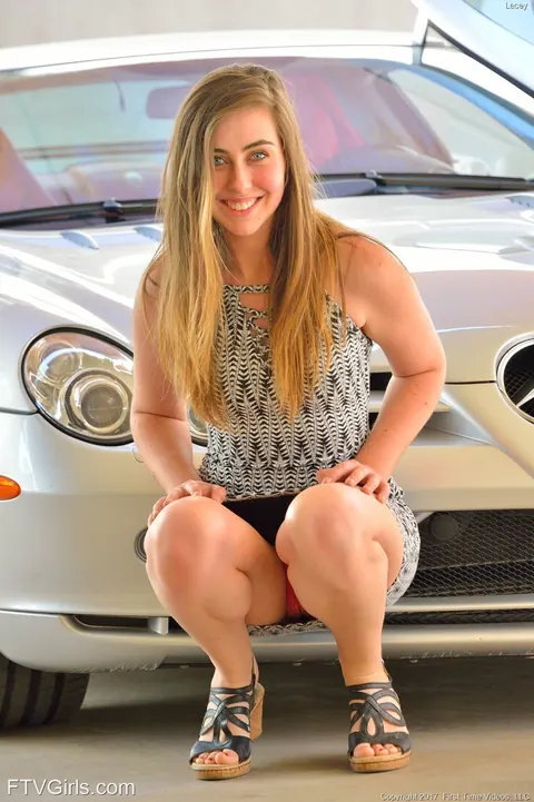 Woman Fingers Her Ass and Rides a Dildo on a Car Outdoors – photo 1 of 21