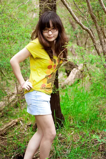 Slim Asian Woman in Glasses Strips Outdoors and Spreads Her Hairy Pussy
