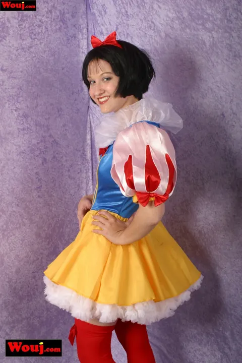 Short-Haired Brunette Poses in Costume and Stockings – photo 15 of 15