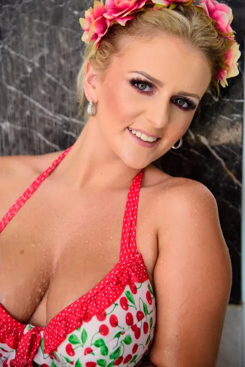 Lycia Sharyl: Thick British Blonde Frees Her Big Tits from Her Bikini in the Bathroom – photo 2 of 12