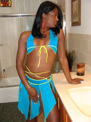 Ebony Trans Woman Bares Cock and Body in Nude Poses