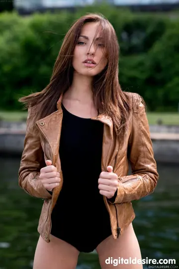 Brunette with Natural Tits Strips and Spreads Wide