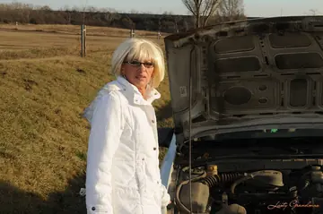 Mature Blonde in Glasses Gets Fucked Through Car Window