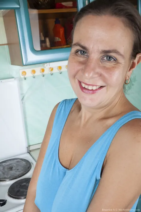 Mature Housewife Bares Her Hairy Pussy in the Kitchen – photo 3 of 20