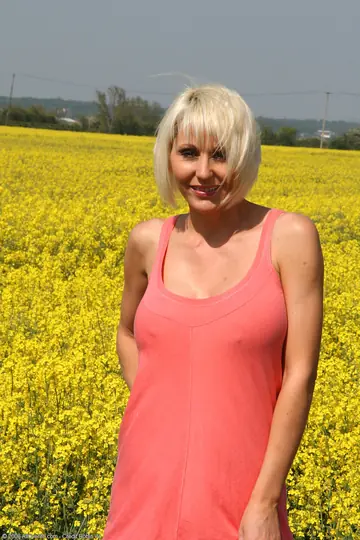 Thick Blonde MILF Strips Out of Her Skirt and Fingers Herself in the Forest
