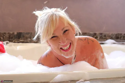 Mature Blonde BBW Poses Nude in the Bathroom with a Bubble Bath – photo 11 of 16