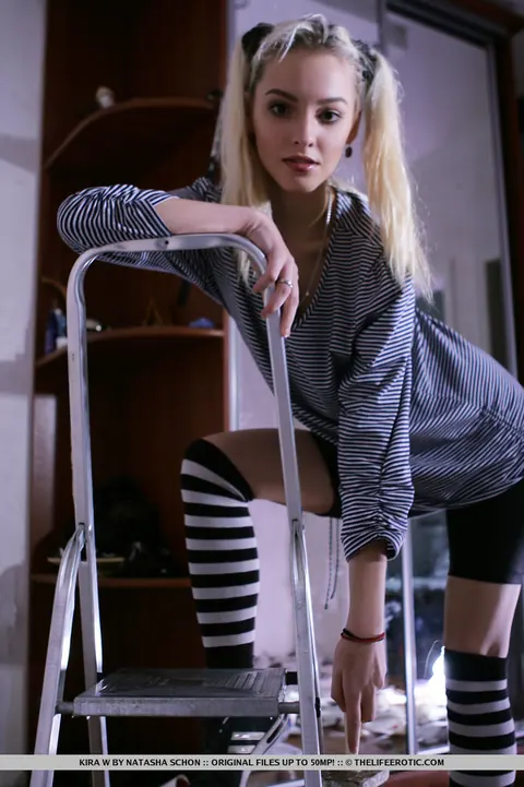 Kira W: Blonde Strips to Striped Socks and Shows Her Shaved Pussy – photo 1 of 16