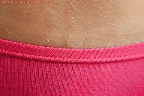 Woman with Glasses Pulls Down Her Panties to Spread Her Hairy Pussy – photo 7 of 16