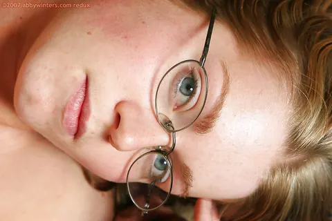 Woman with Glasses Pulls Down Her Panties to Spread Her Hairy Pussy – photo 15 of 16