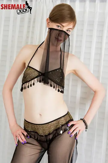 Trans Woman with Small Tits Stands Nude and Poses